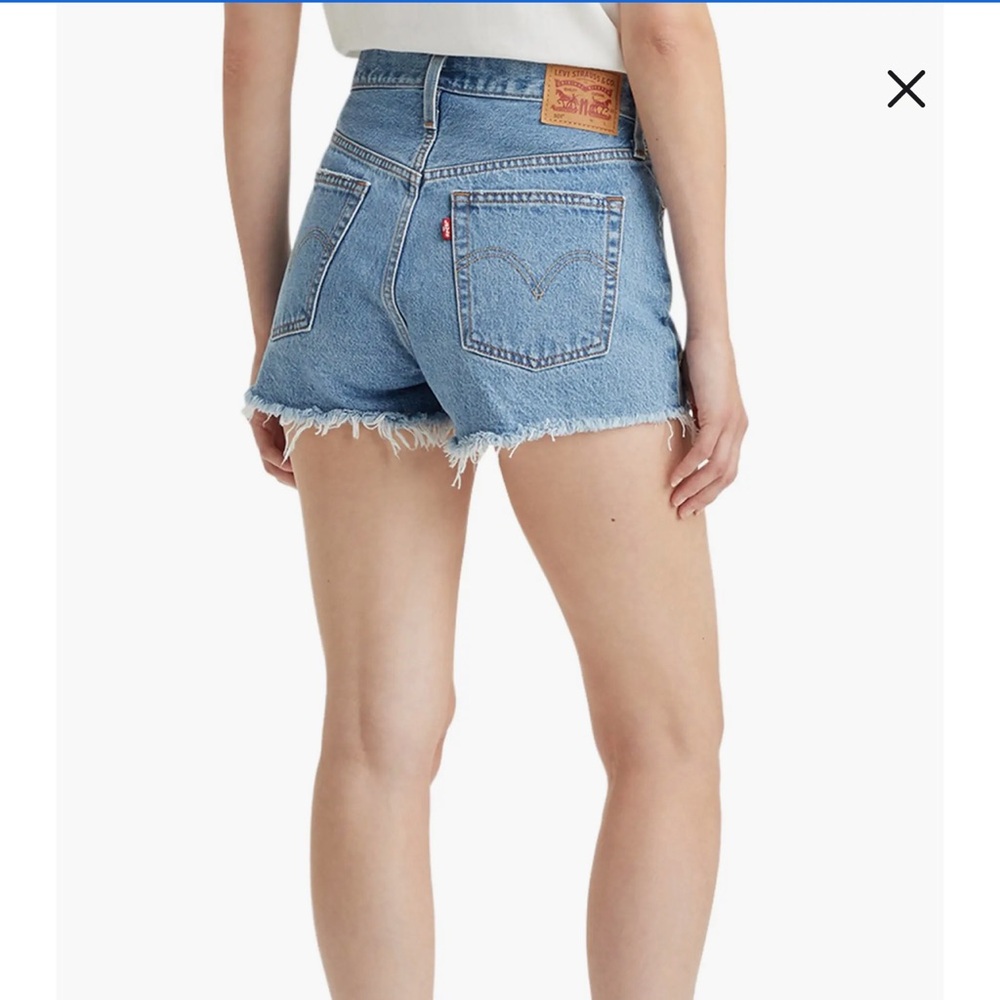 Levi’s 501 high waisted distressed jean shorts